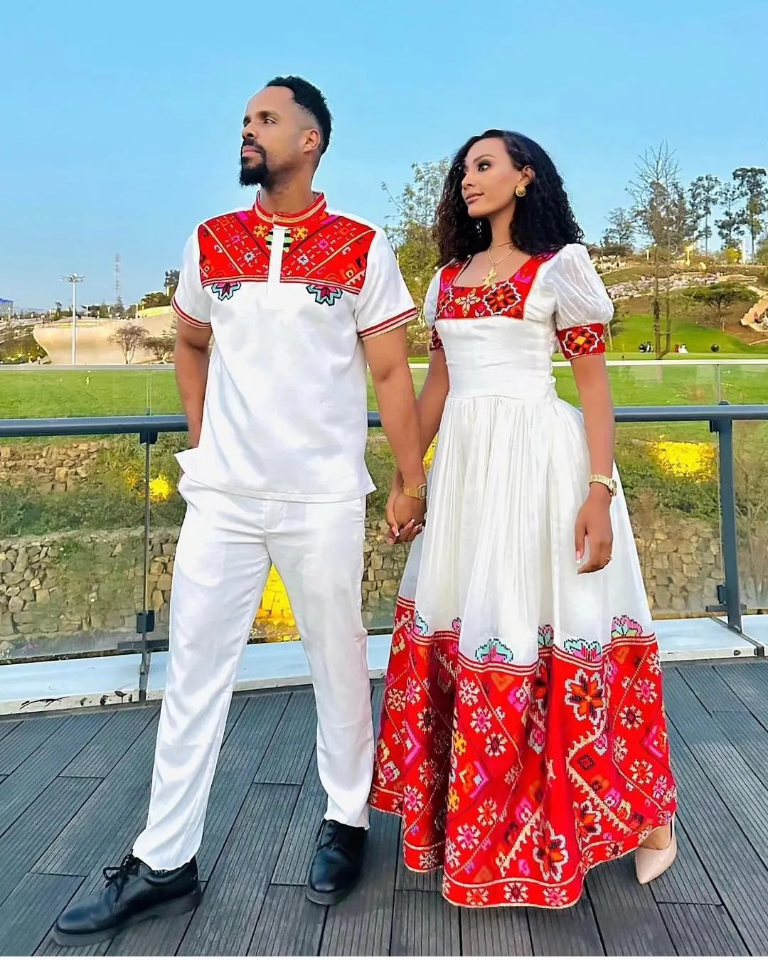 Passionate Red Bliss: Vibrant Habesha Couples Outfit in Menen Fabric